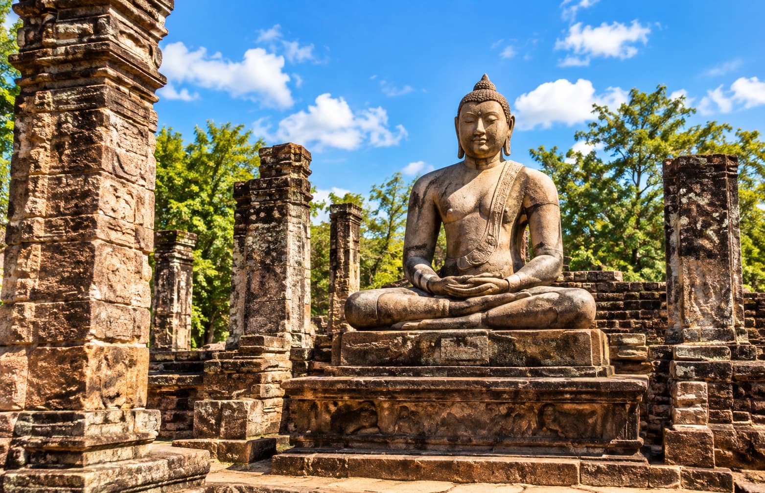 A seated Buddha among Sri Lanka’s ancient stone ruins